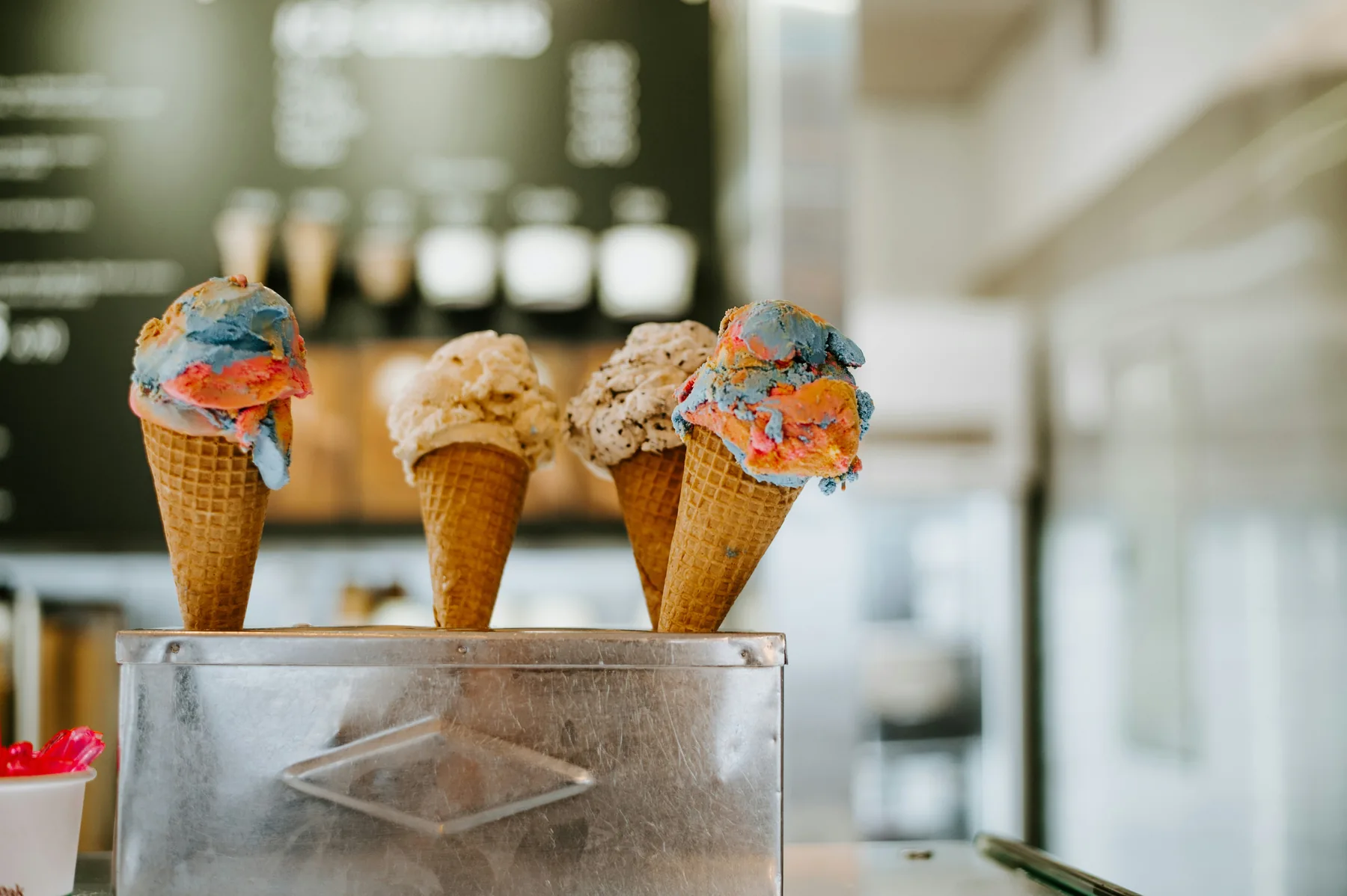 A row of colourful artisan ice cream cones